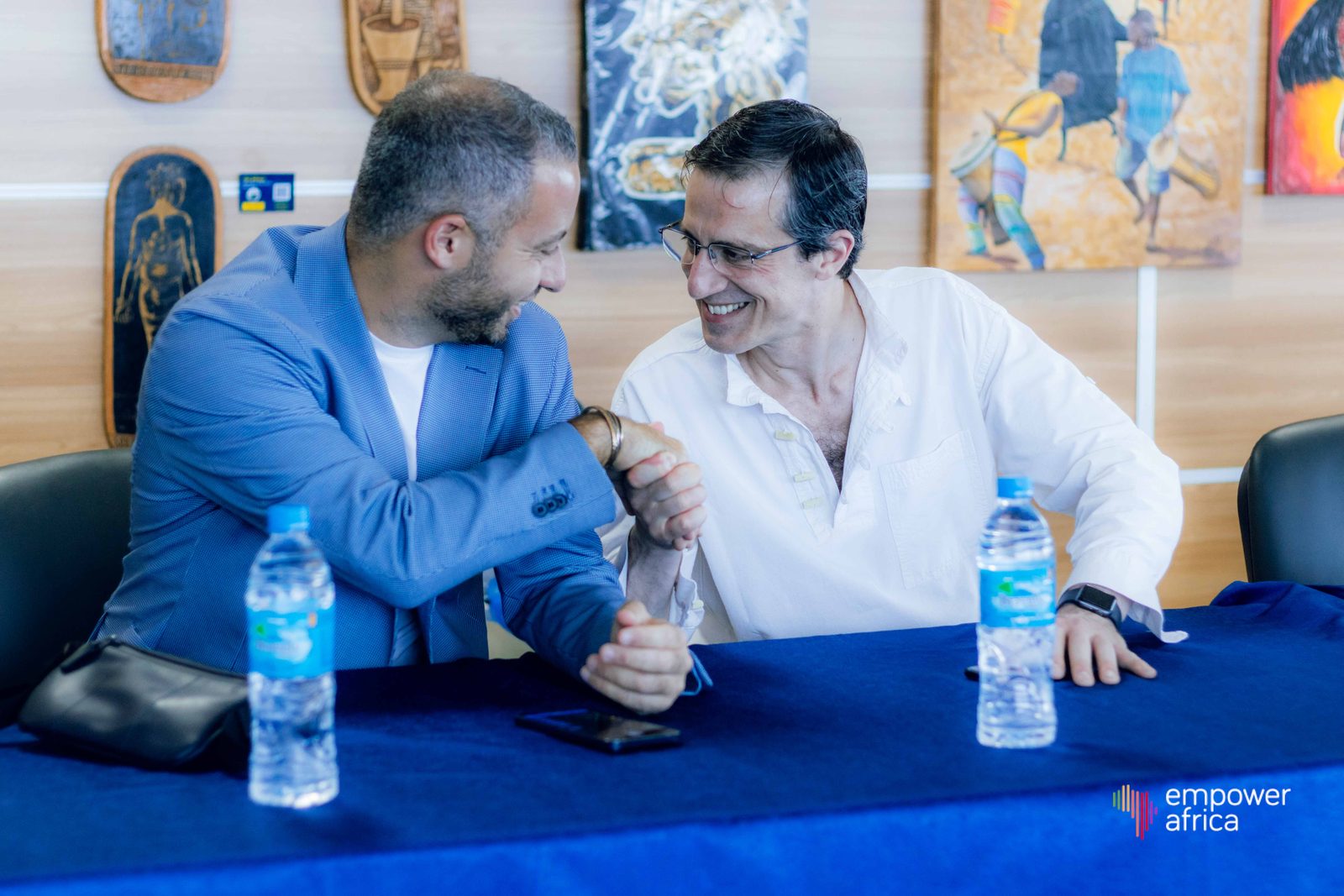 Business leaders greeting one another